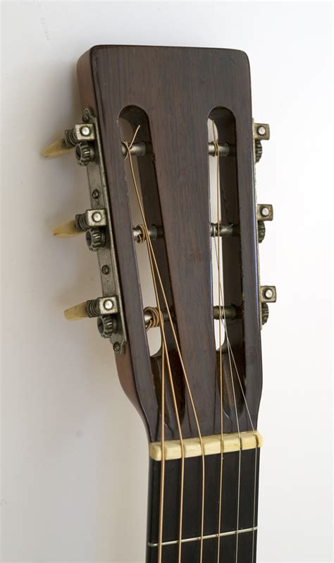 vintage acoustic headstock.